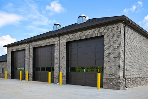 image of large commercial building with 3 garage doors